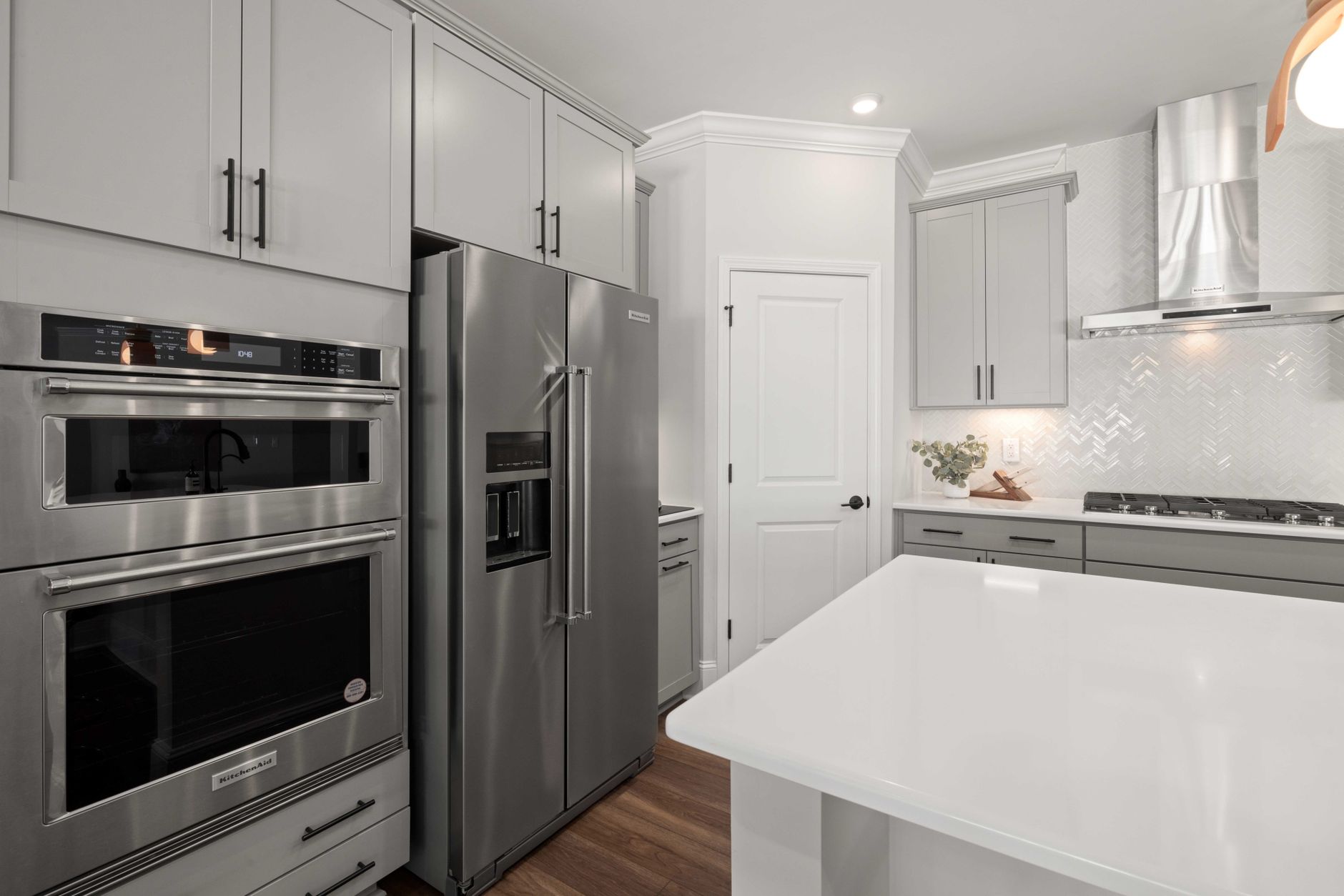 Contemporary kitchen featuring sleek stainless steel appliances and minimalist design in Scottsdale, AZ